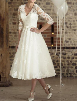 Women's wedding dress with long sleeves and V-neck | Midi